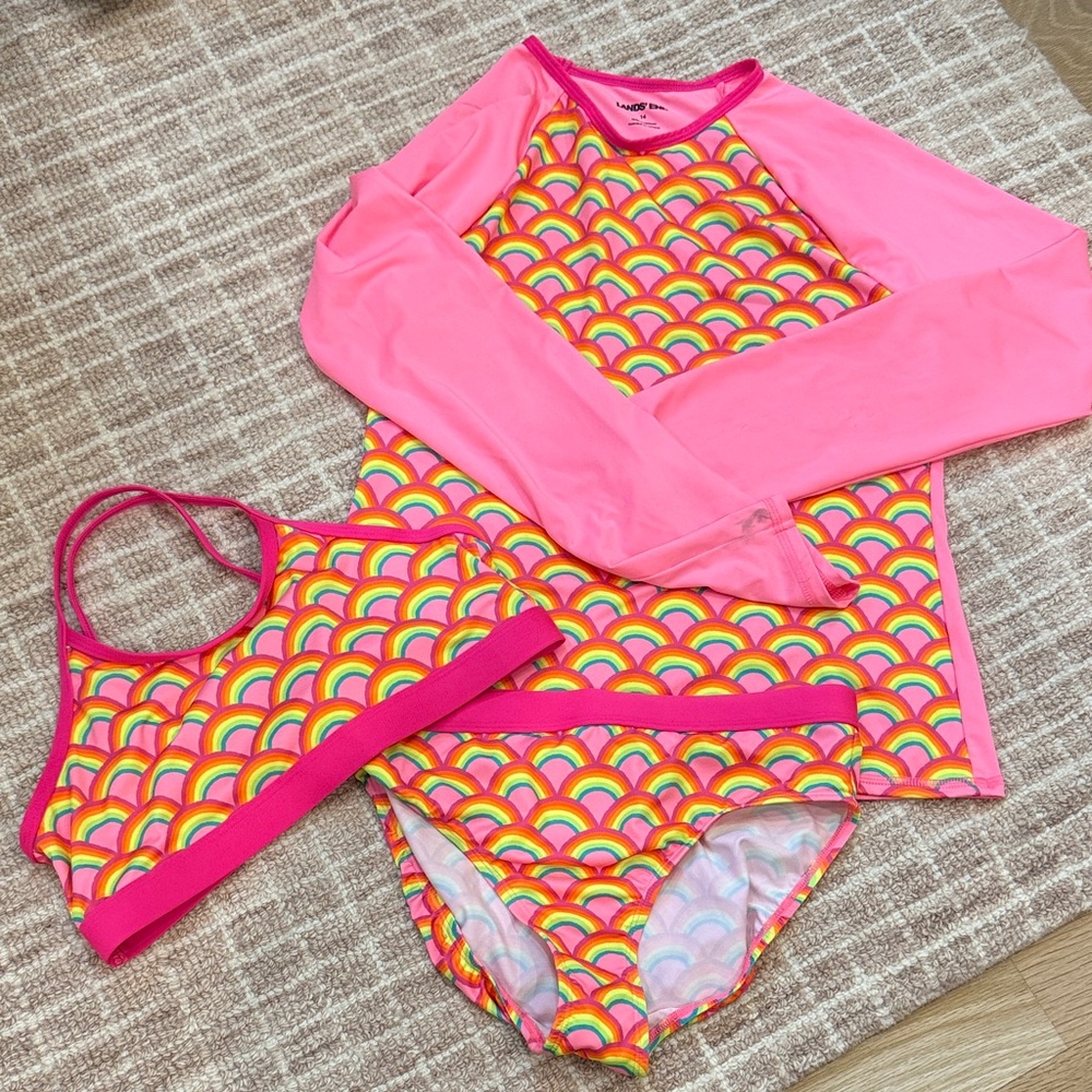 Lands and rash guard and bikini top and bottom